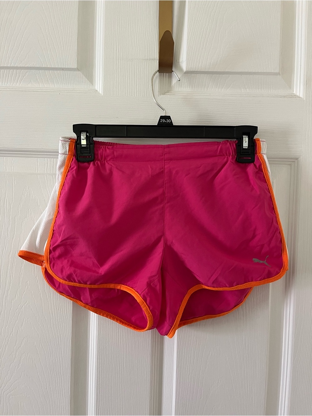 PUMA Women's Pink Running Shorts with Orange Trim